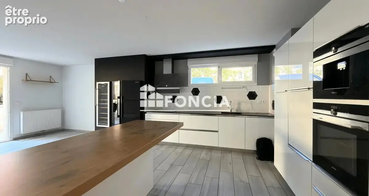La folie des grandeurs pour ce 3 pièces avec 2 stationnements privatifs - Quartier Bourran - photo 2
