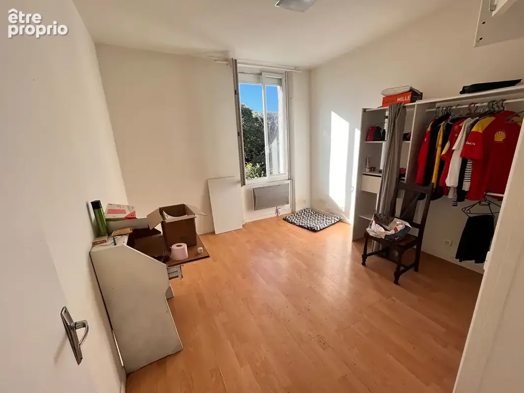 Immeuble en ville 2 appartements avec cours et garages - photo 11