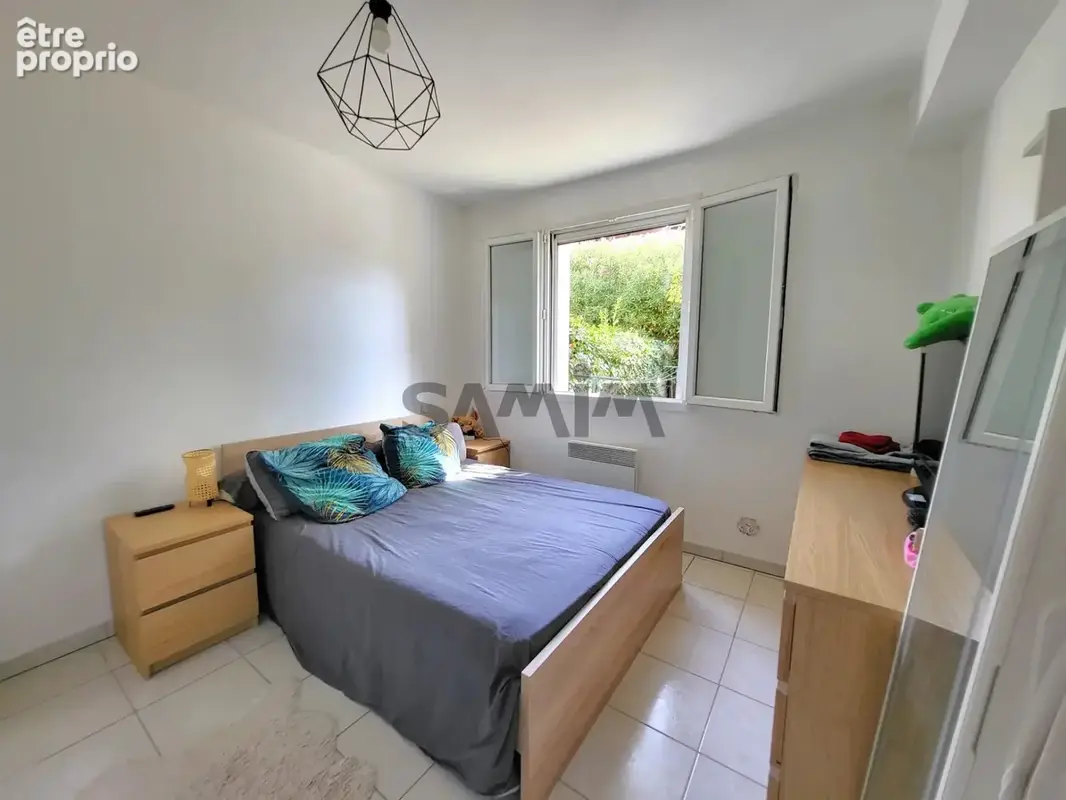 A vendre -  appartement de plain pied avec jardin et 2 place - photo 6