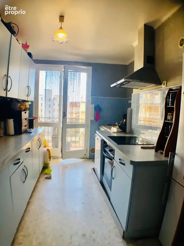 Vente appartement T4 avec balcon, cave et place de parking sécurisée, 66000 Perpignan, quartier de la gare. - photo 3