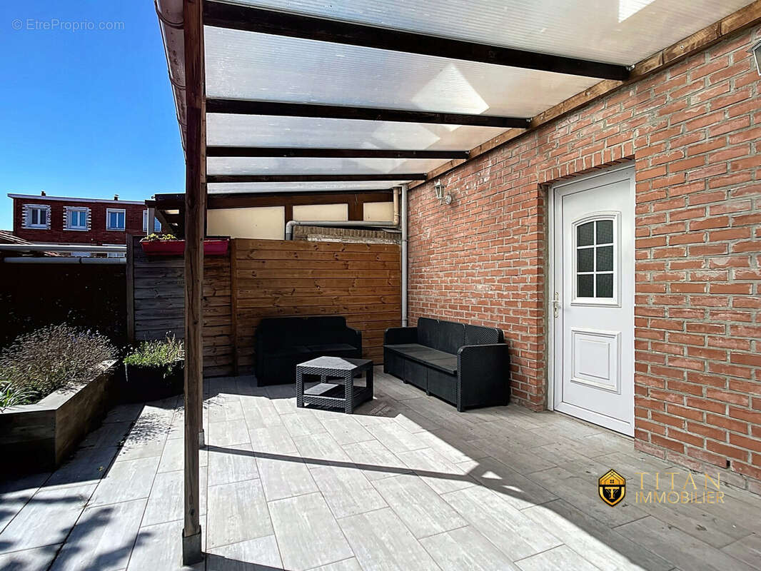  Maison familiale 4 chambres, jardin et garage - Petite-Synthe - Titan Immobilier - Maison à DUNKERQUE