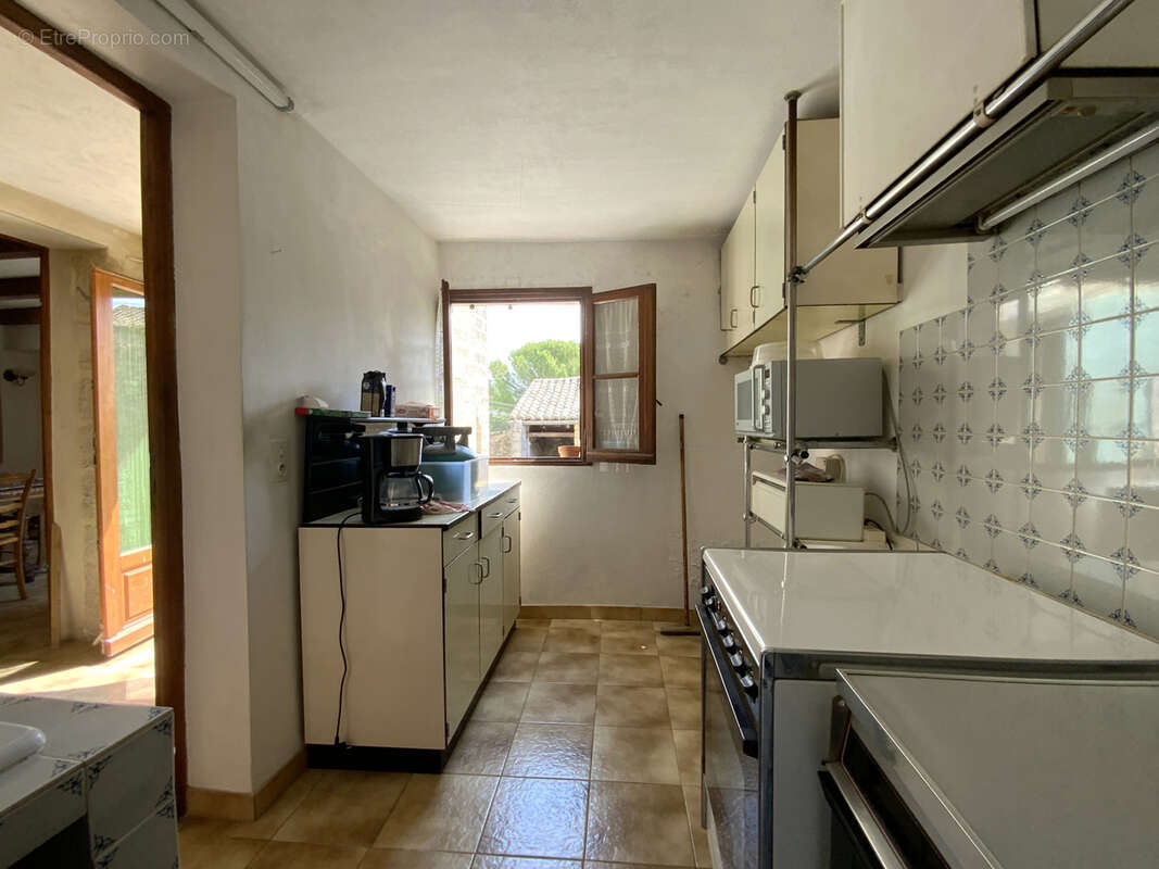 Maison en pierre à 4 km d' Uzès, jardin et grand garage. - photo 19
