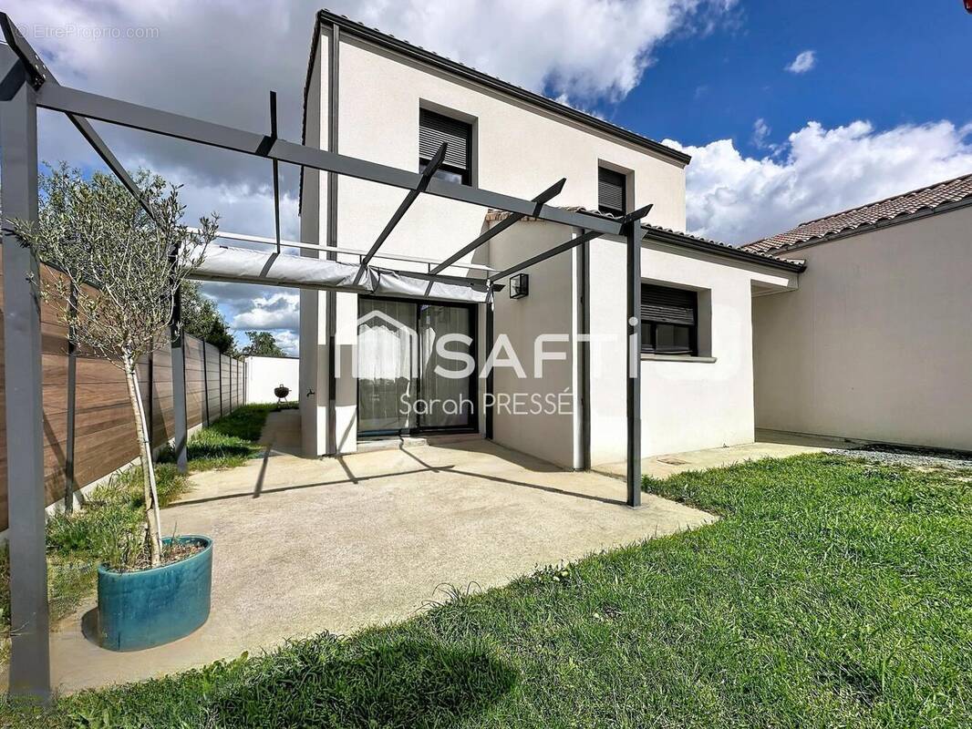 Photo 1 - Maison à SAINT-JULIEN-DE-CONCELLES