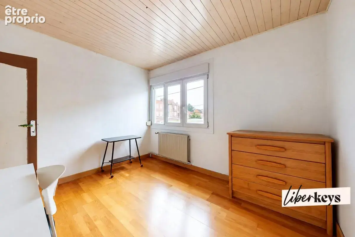 Maison de 120m² avec 4 chambres, jardin, garage, et cave - photo 7