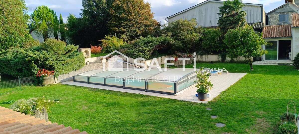 Photo 2 - Maison à SAINTE-LHEURINE