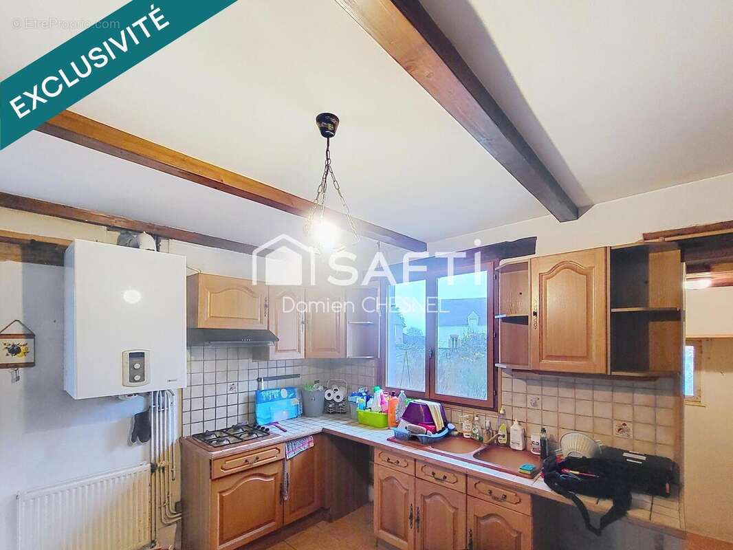 Photo 5 - Maison à BESSAIS-LE-FROMENTAL