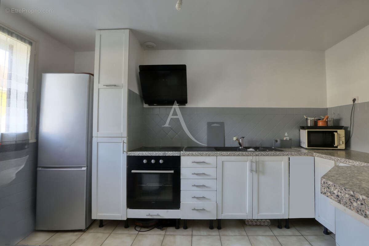 Maison Les Mureaux 6 pièce(s) 129 m² 4 chambres - photo 4