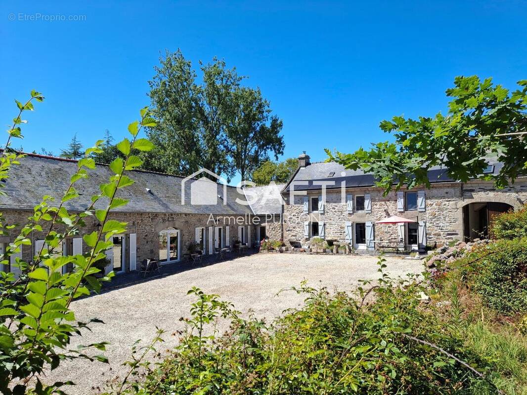 Photo 1 - Maison à PLOMODIERN