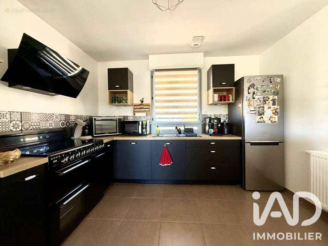 Maison 89 m² à Thurins  - photo 4