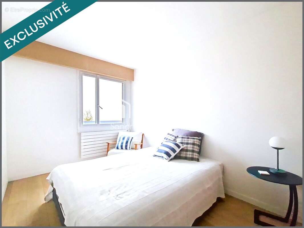 Photo 9 - Appartement à COURBEVOIE