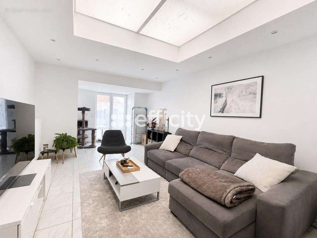 Maison 98 m² à Carvin  - photo 2