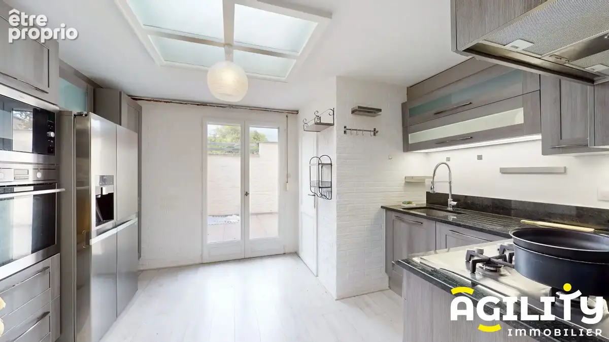 Maison 4 pièces 76 m² à vendre à Croix (59170) - photo 3