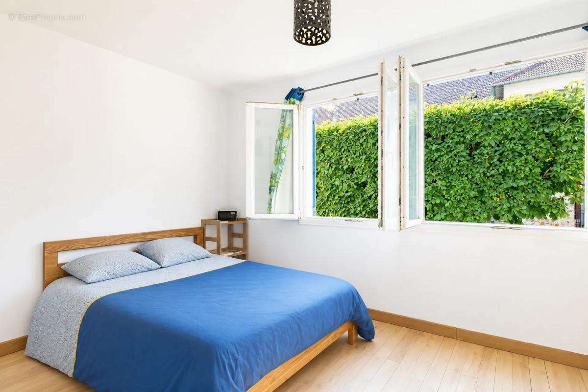Maison de 6 pièces de 122 m² à Savigny-sur-Orge - photo 8