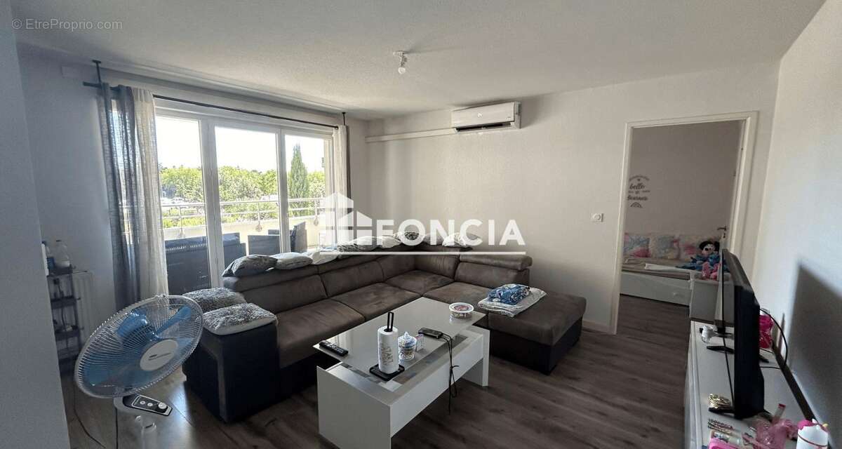 Appartement de type 3 dans une résidence sécurisée avec place de parking - photo 3