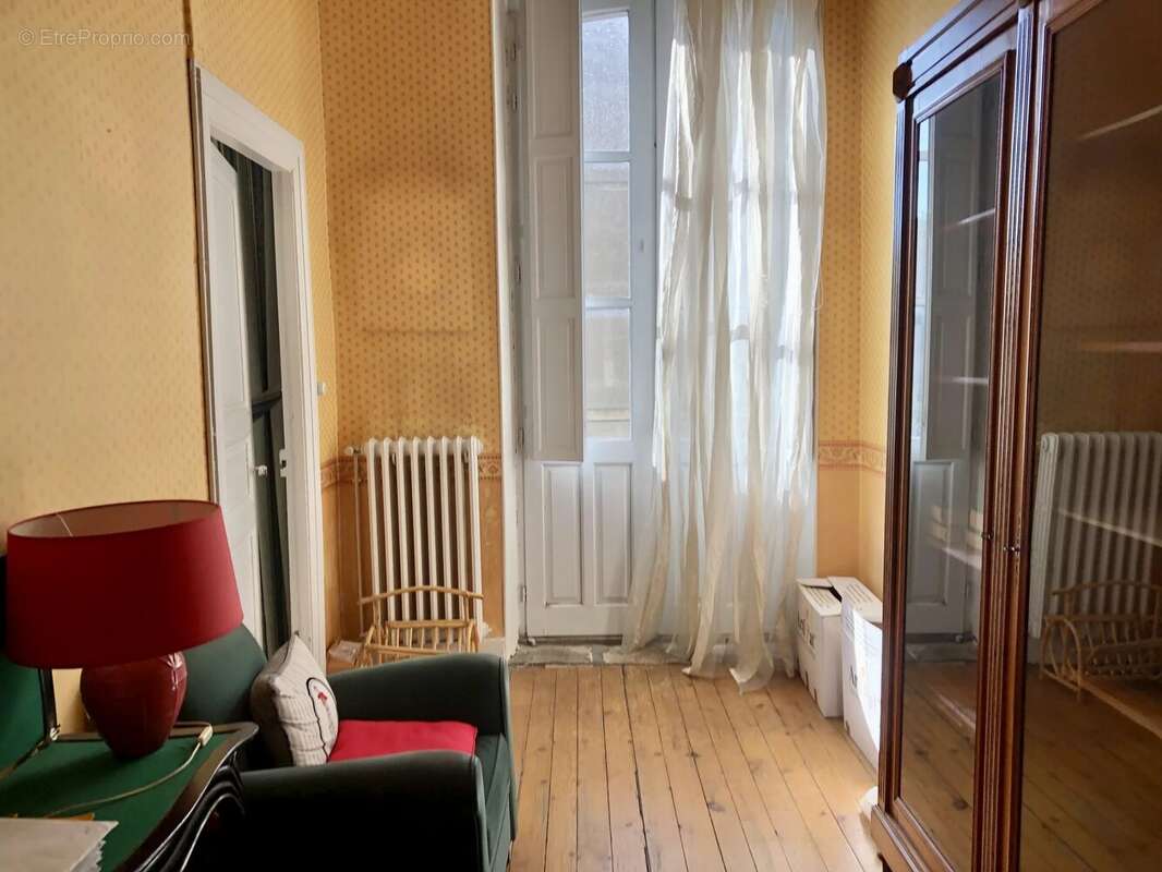 Élégant immeuble de style haussmannien avec jardin privé et fort potentiel d'investissement - photo 10