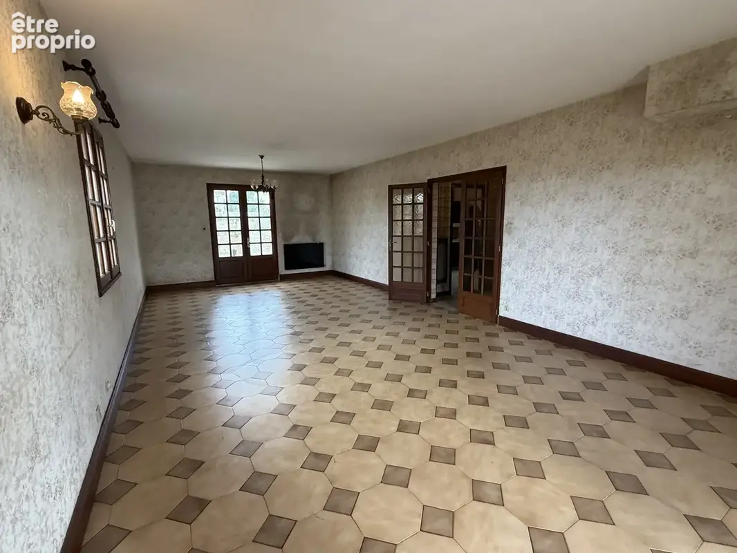 Maison 7 pièces 170 m² à vendre à Ruelle-Sur-Touvre (16600) - photo 5