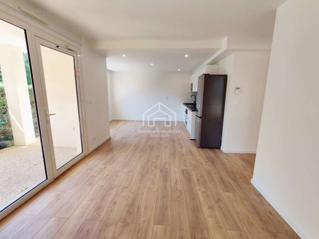 Magnifique appartement en rez de jardin rénové à neuf - photo 3
