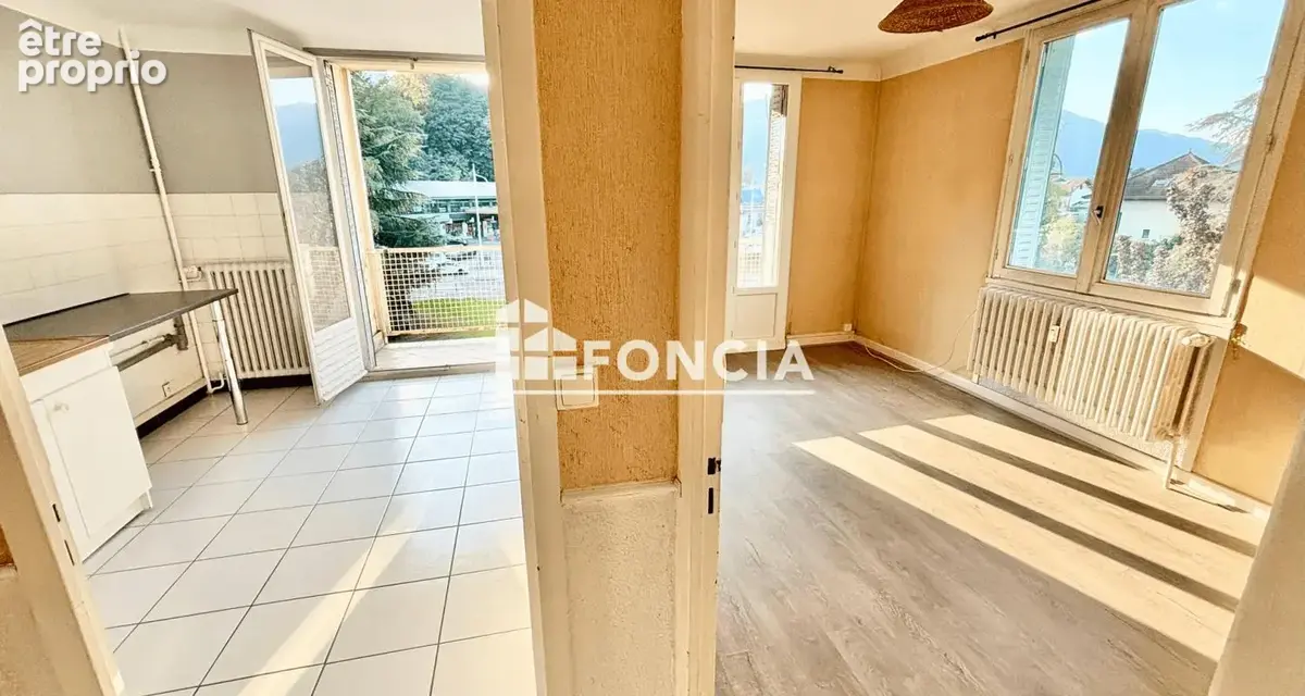 T3 de 56 m² avec balcon, vue dégagée et fort potentiel (Travaux de rénovation énergétique votés & payés) - photo 3