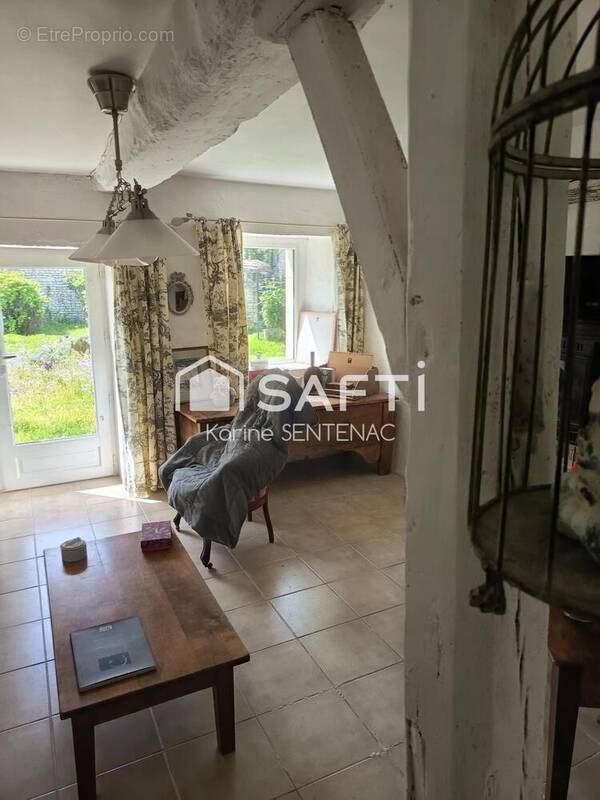 Photo 1 - Maison à LA ROCHE-RIGAULT