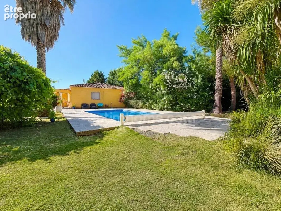 Maison de plain-pied 155 m² avec garage de 92m2, piscine et terrain arboré à MONTAGNAC (34) - photo 10