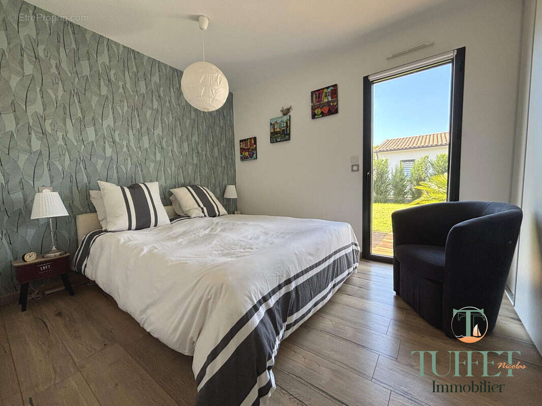 Maison 100 m² à Breuillet  - photo 8