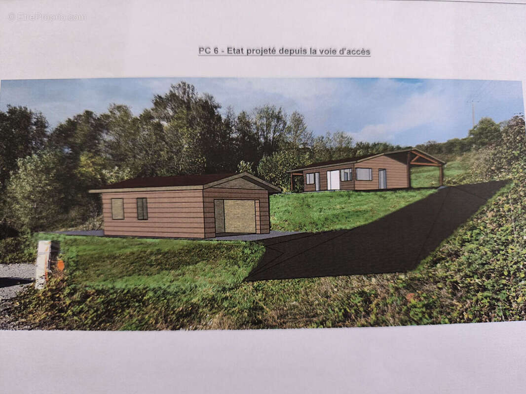 Vue dominante pour ce beau terrain sur la commune de Planioles - photo 2