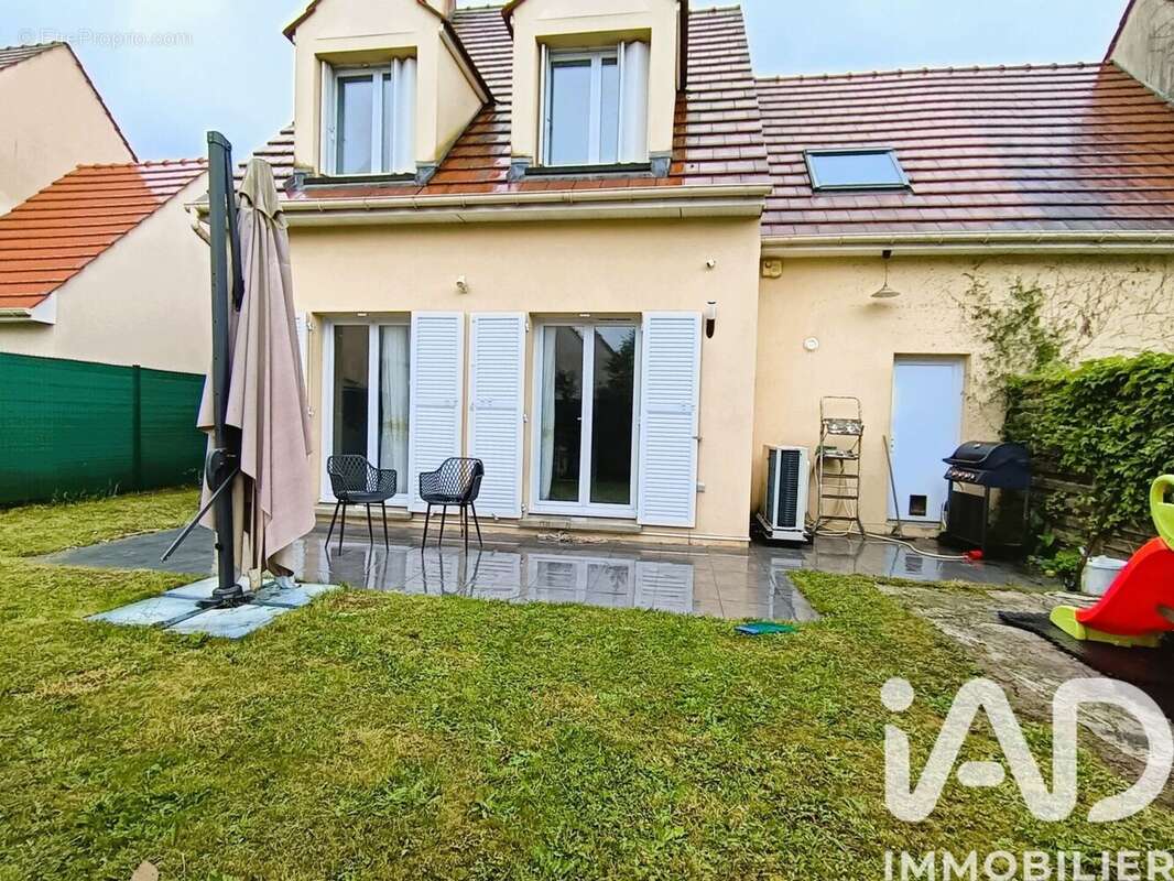 Photo 2 - Maison à SAVIGNY-LE-TEMPLE