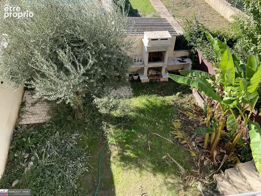 Villa T5 de 110 m²  vous invite à poser vos valises dans un cadre alliant charme et fonctionnalité sur 145 m² de terrain clos et - photo 21