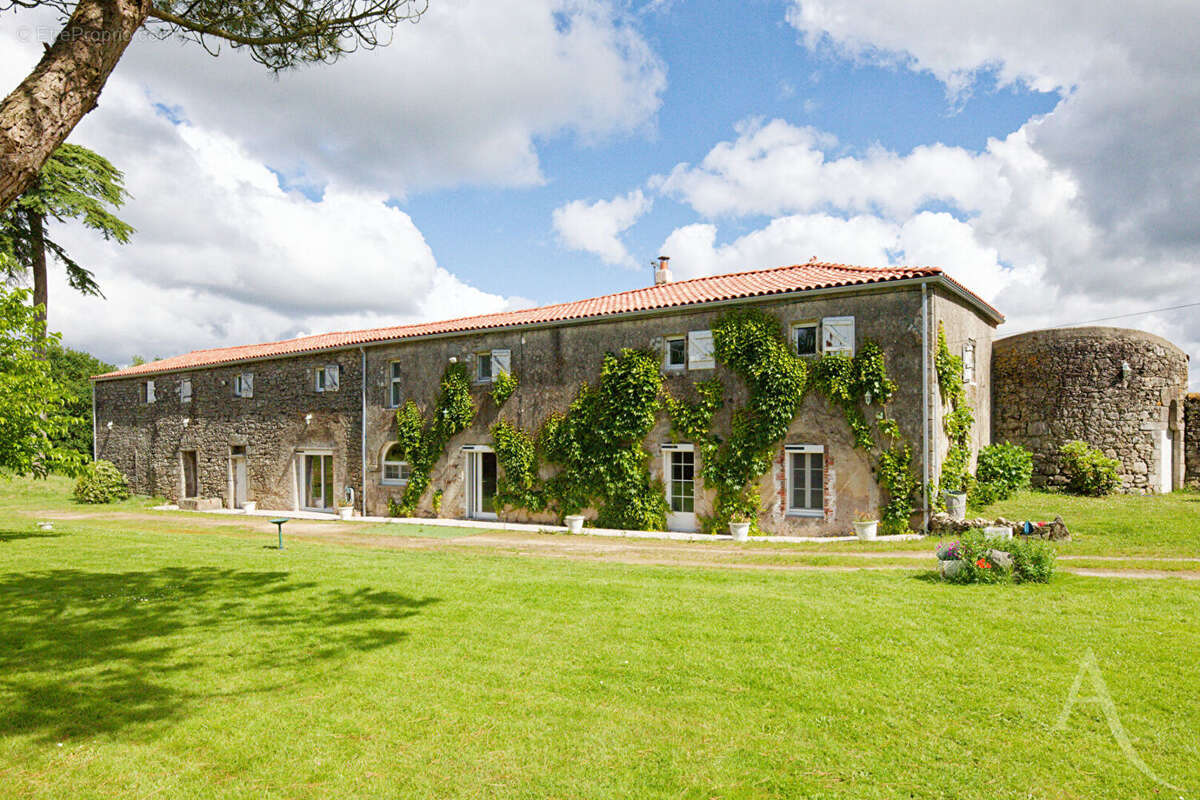 Maison à BEAUFOU