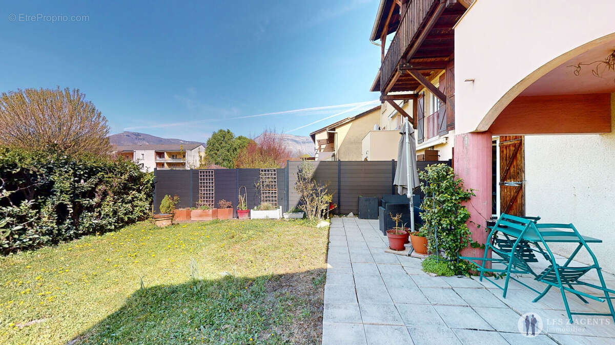 T4 rénové avec jardin - photo 3