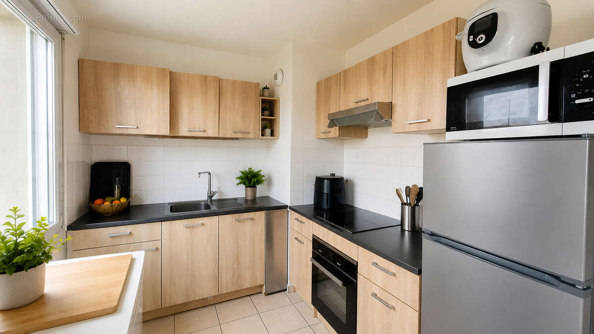 Appartement à vendre Le Petit-Quevilly 67 m²  2 chambres  2 parkings privés - photo 3