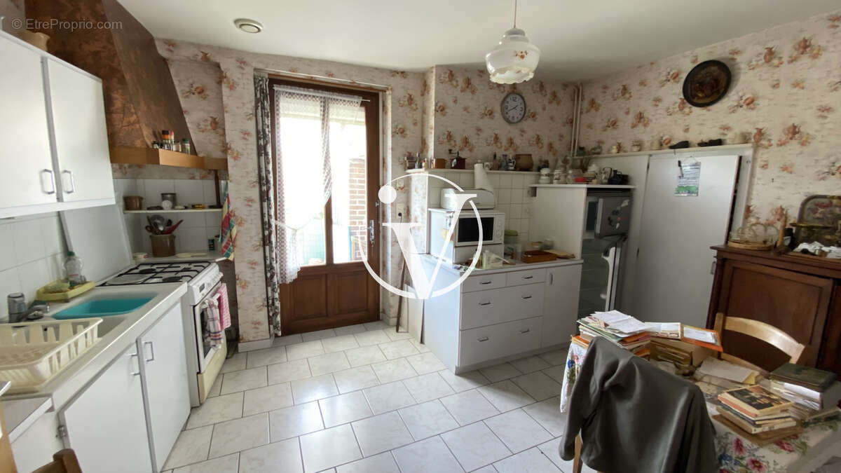 Maison à AZE