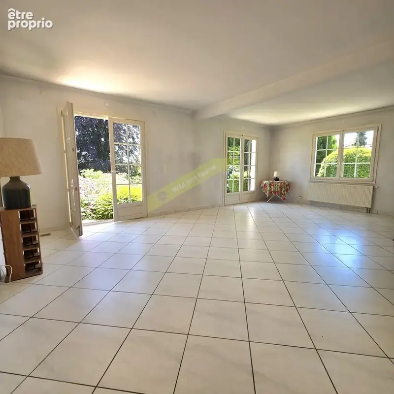 Maison de plain-pied dans un cadre verdoyant exceptionnel de 31 ares - photo 7