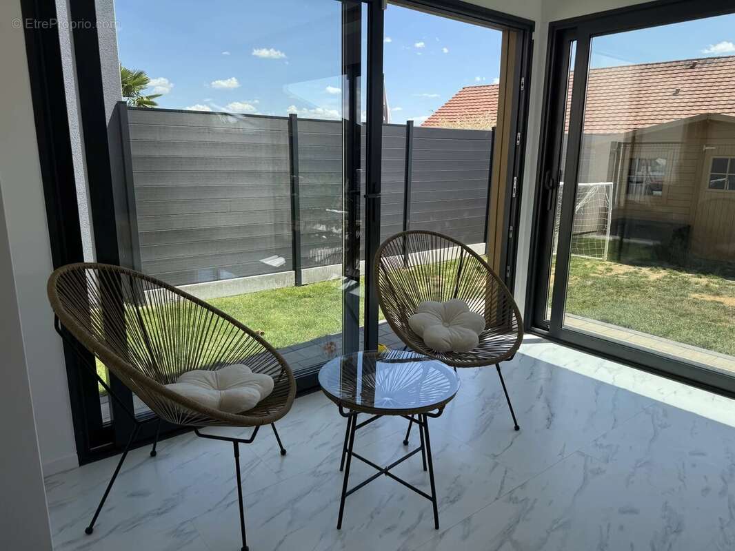 Maison familiale de 127,45 m² habitables avec jardin, terrasse et garage - photo 5