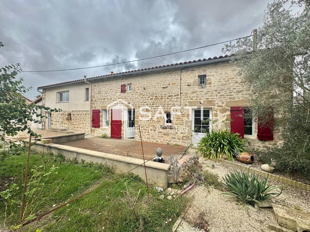 Photo 1 - Maison à MELLE