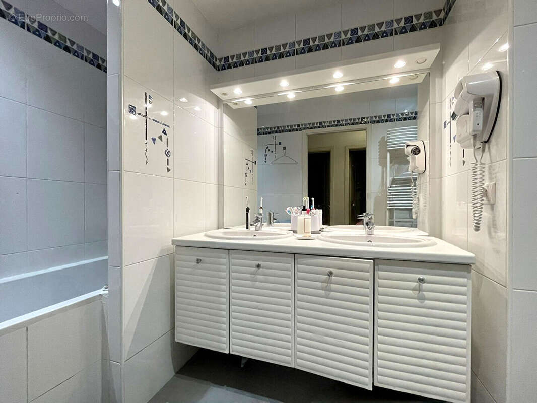 Appartement en rez-de-jardin avec garage, parking, cave, terrasse et jardin - photo 14