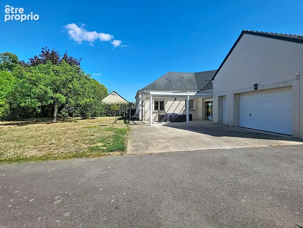 Maison de plain pied de 192m²  Saint-Jean-De-Linières - photo 11