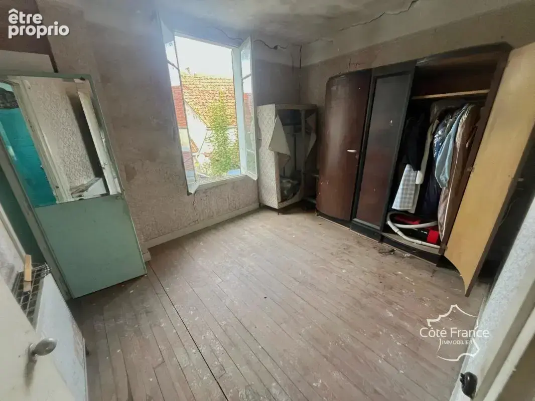 Maison à rénover avec grand garage et un jardin de 100m2 - photo 8