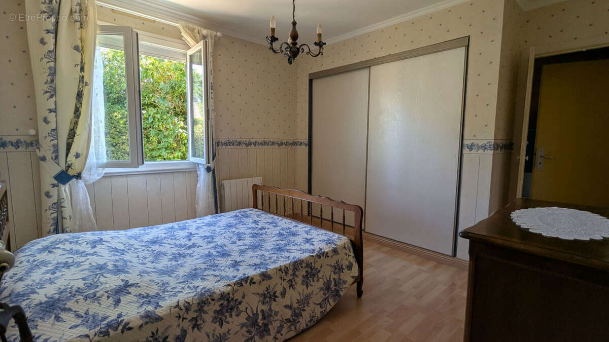 Maison de plain-pied 128 m² avec jardin à Val-de-Reuil 4 chambres - photo 5