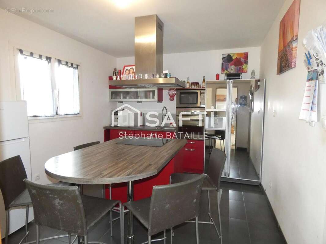 Maison 136 m² à Angliers  - photo 3