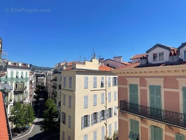 3 pièces - centre ville - photo 2
