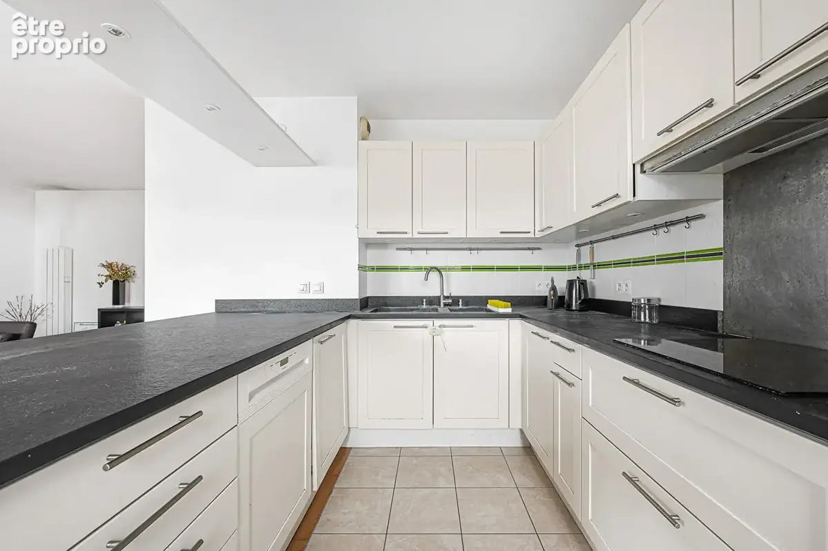 Appartement familial 4 pièces - 92,45 m² avec terrasse, parking et 2 caves - Pernety - photo 4