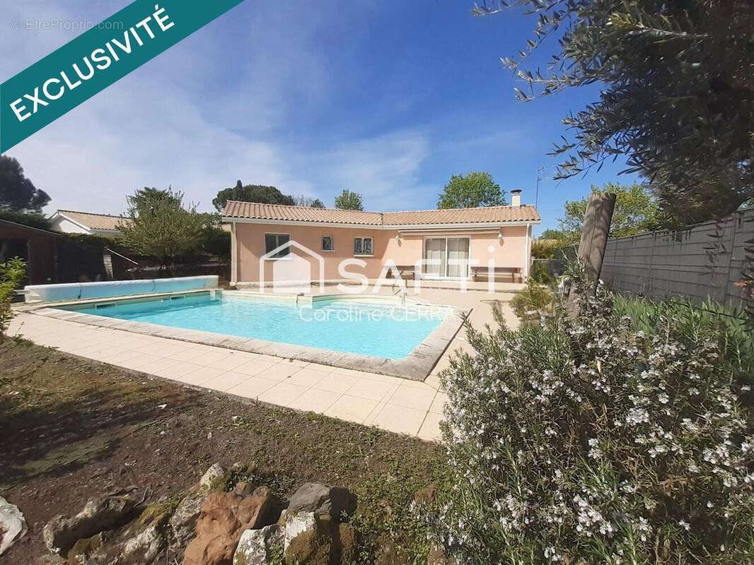 Photo 1 - Maison à LE TAILLAN-MEDOC