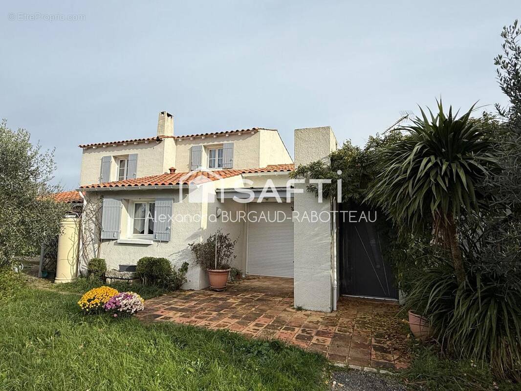 Photo 1 - Maison à LA CHAPELLE-DES-POTS