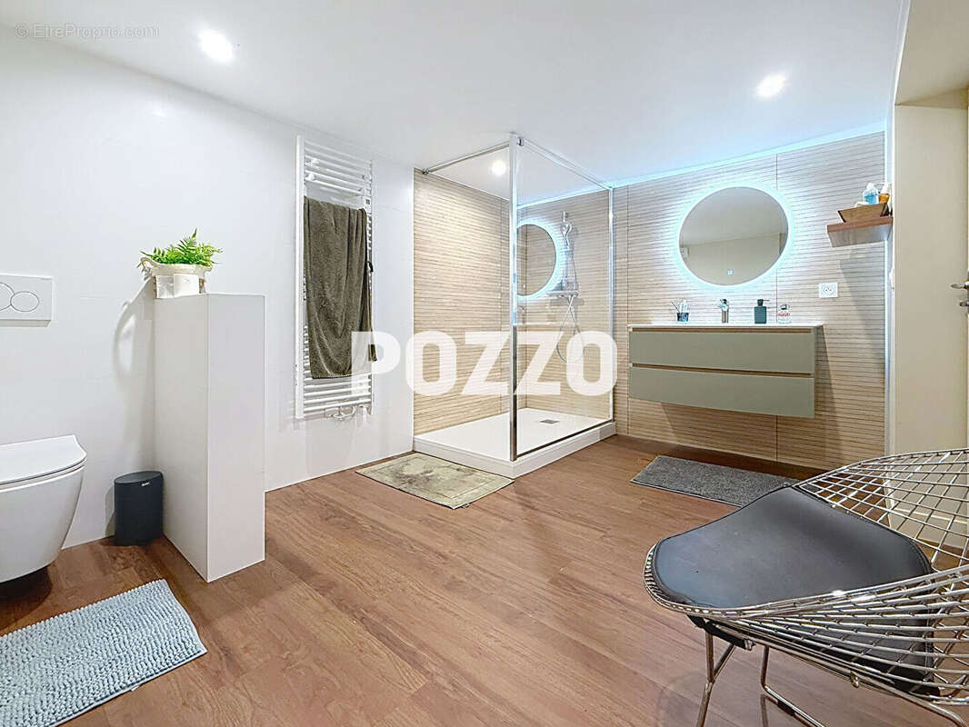Maison de 7 pièces (323 m²) en vente à DONVILLE LES BAINS - photo 11