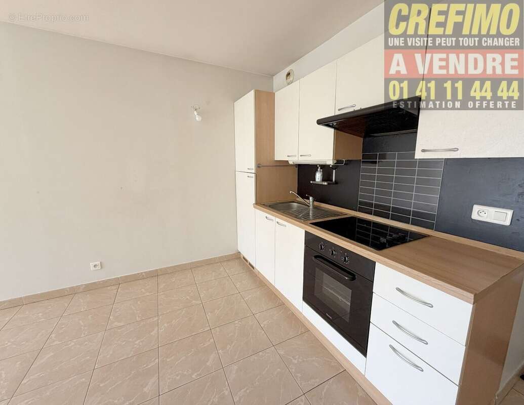 Appartement + balcon + Parking à vendre à Asnières-sur-Seine - Agence immobilière CREFIMO - photo 2