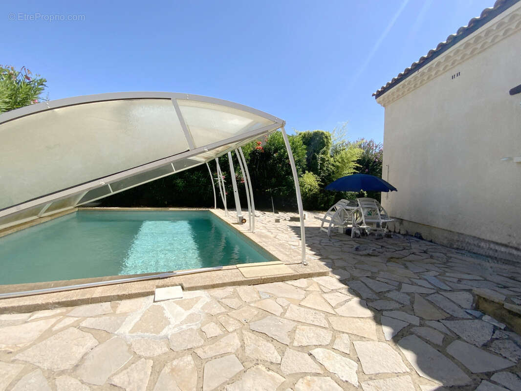 Villa cossue située à Uzès avec terrain de 1400 m2 avec piscine. - photo 5
