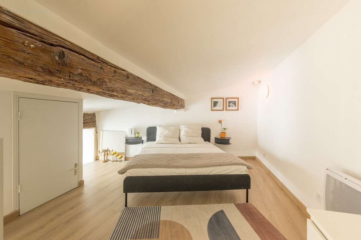 Appartement loft rénové avec mezzanine et belle hauteur sous plafond dans l'Écusson de Montpellier - photo 13