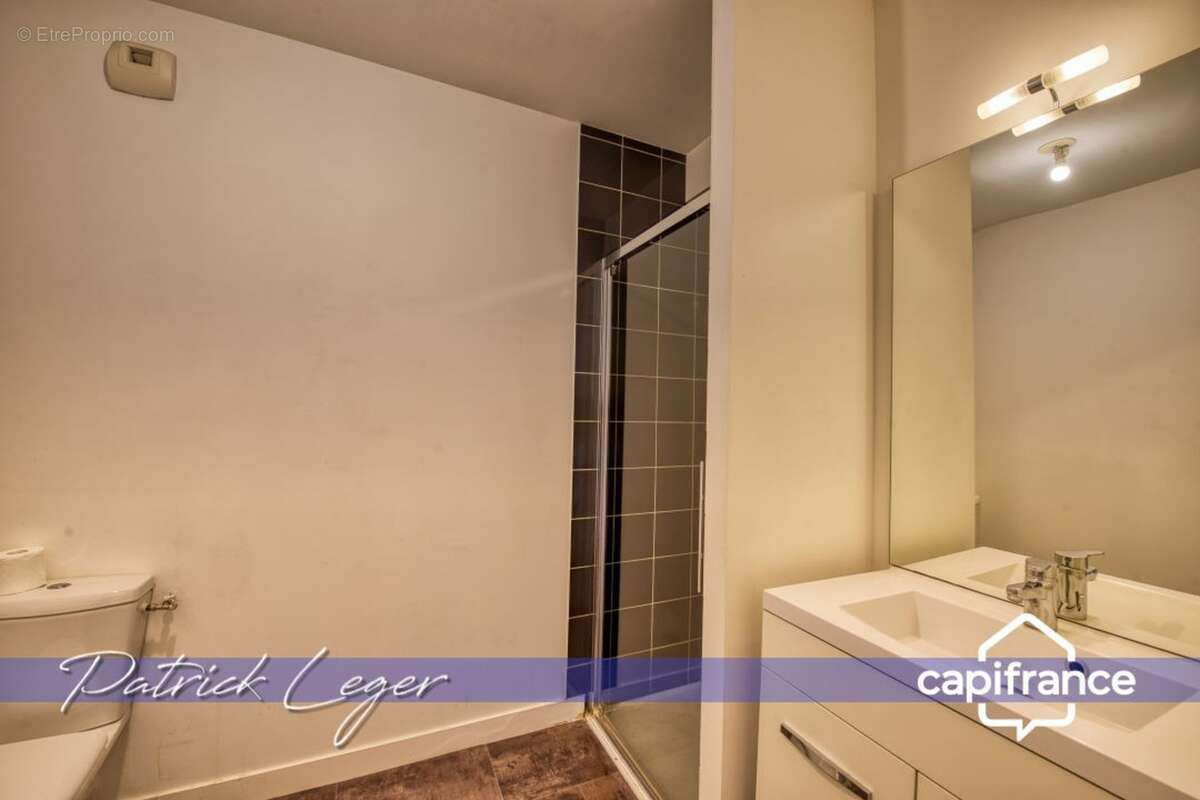 PÉRIGNY (17) – Élégant T3 modulable avec grande terrasse couverte & parking sous-sol - photo 16