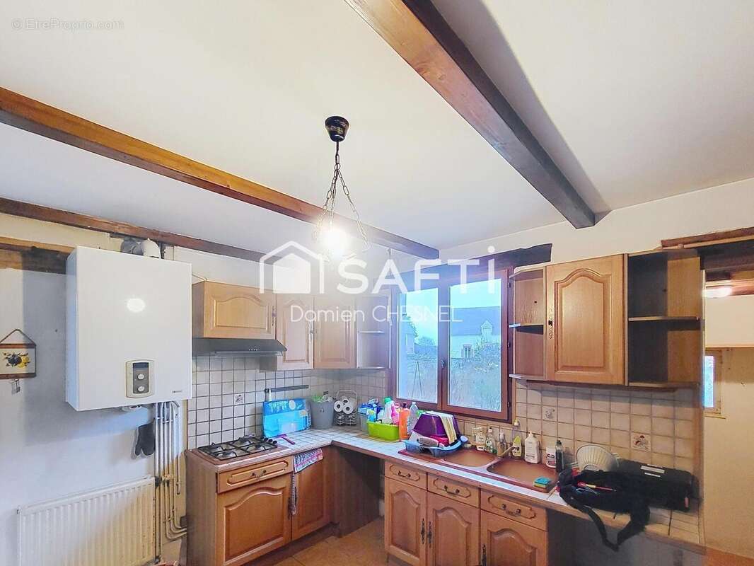 Maison 110 m² à Bessais-Le-Fromental  - photo 7